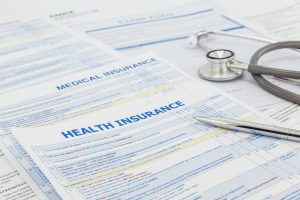 Medical insurance application and legal contract - Baller Alert