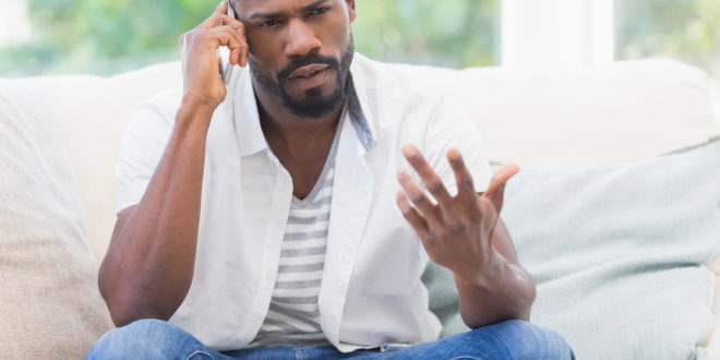 black man on phone