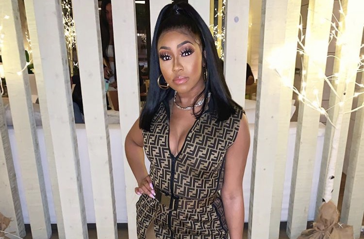 Ballerific Fashion: Yung Miami In Fendi Mini Dress and Glossy Beige Neoprene Boots