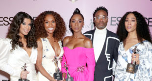 Pose Honored for Essence