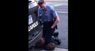 Police Officer Kneeling On Neck