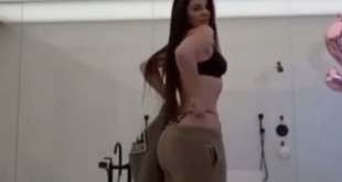 Khloe Kardashian holding in her stomach