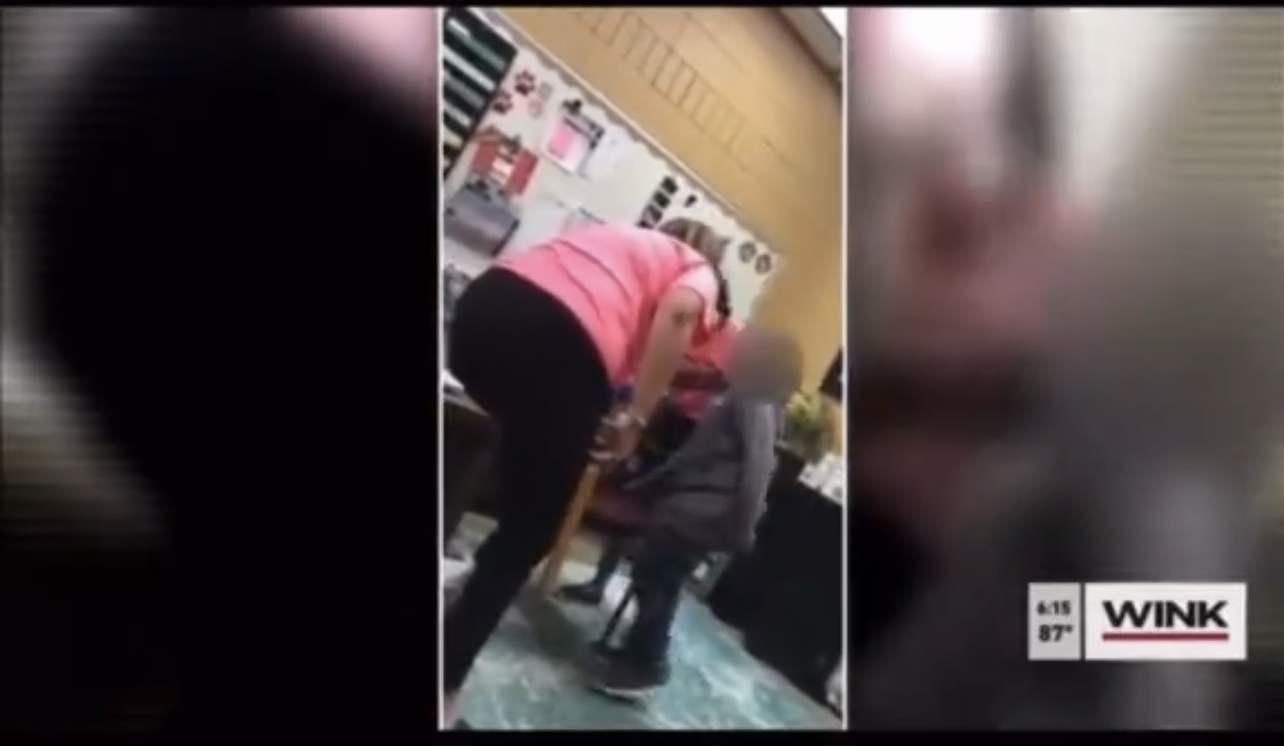 teacher paddles student