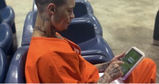 Inmate with Tablet pic from AP