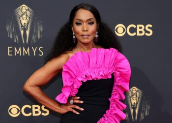 Angela Bassett Celebrates Her First-Ever Emmy Win: "It Feels Really Good to Hold This in My Hands"