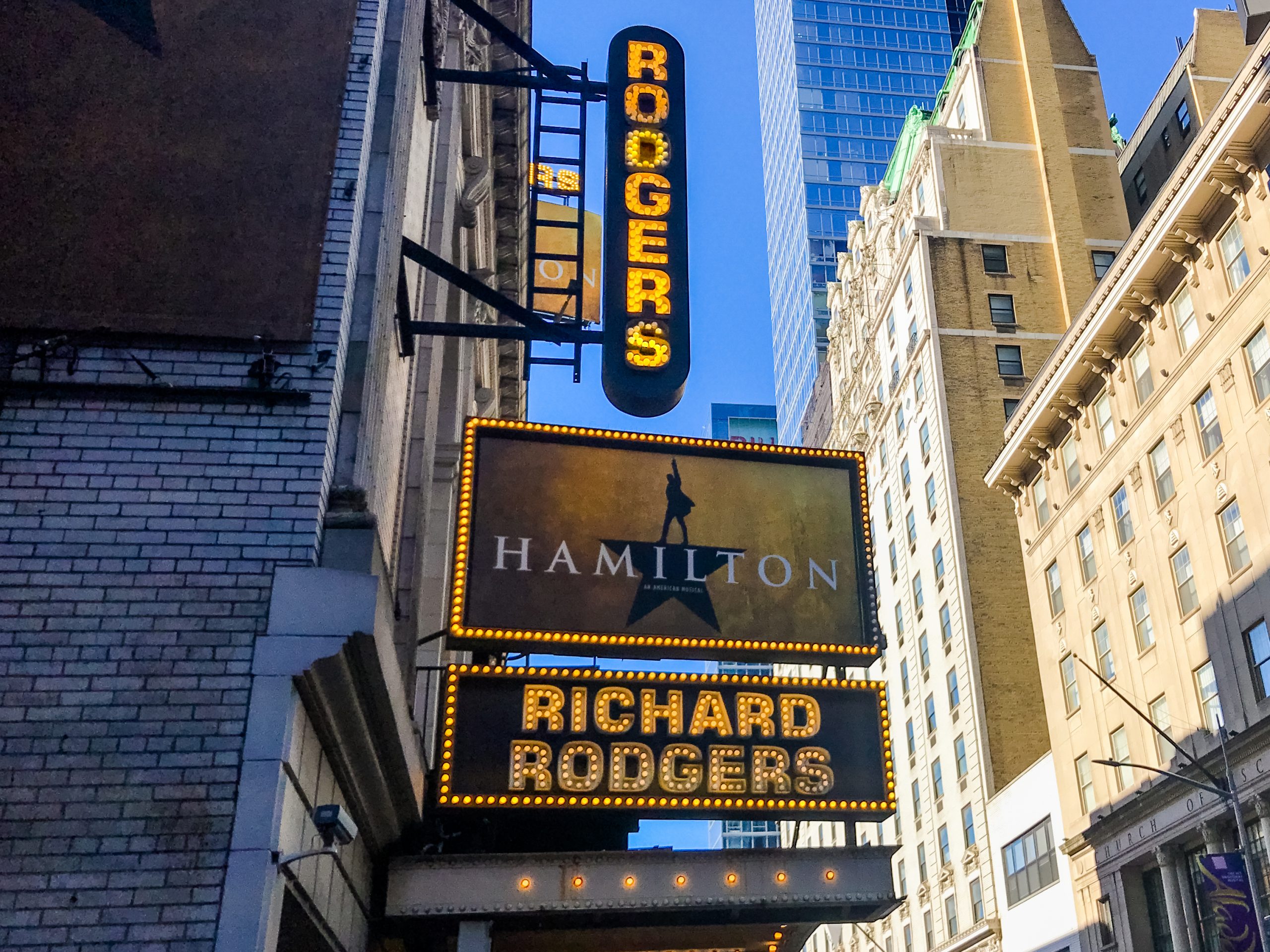 Signage for Hamilton musical above the Rodgers Theatre - Baller Alert Hamilton