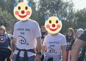 Couples wear raunchy message on T-shirt at Disney theme park.