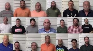 Twenty people arrested in alleged prostitution ring.