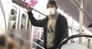Unidentified man who slapped woman on NYC train.