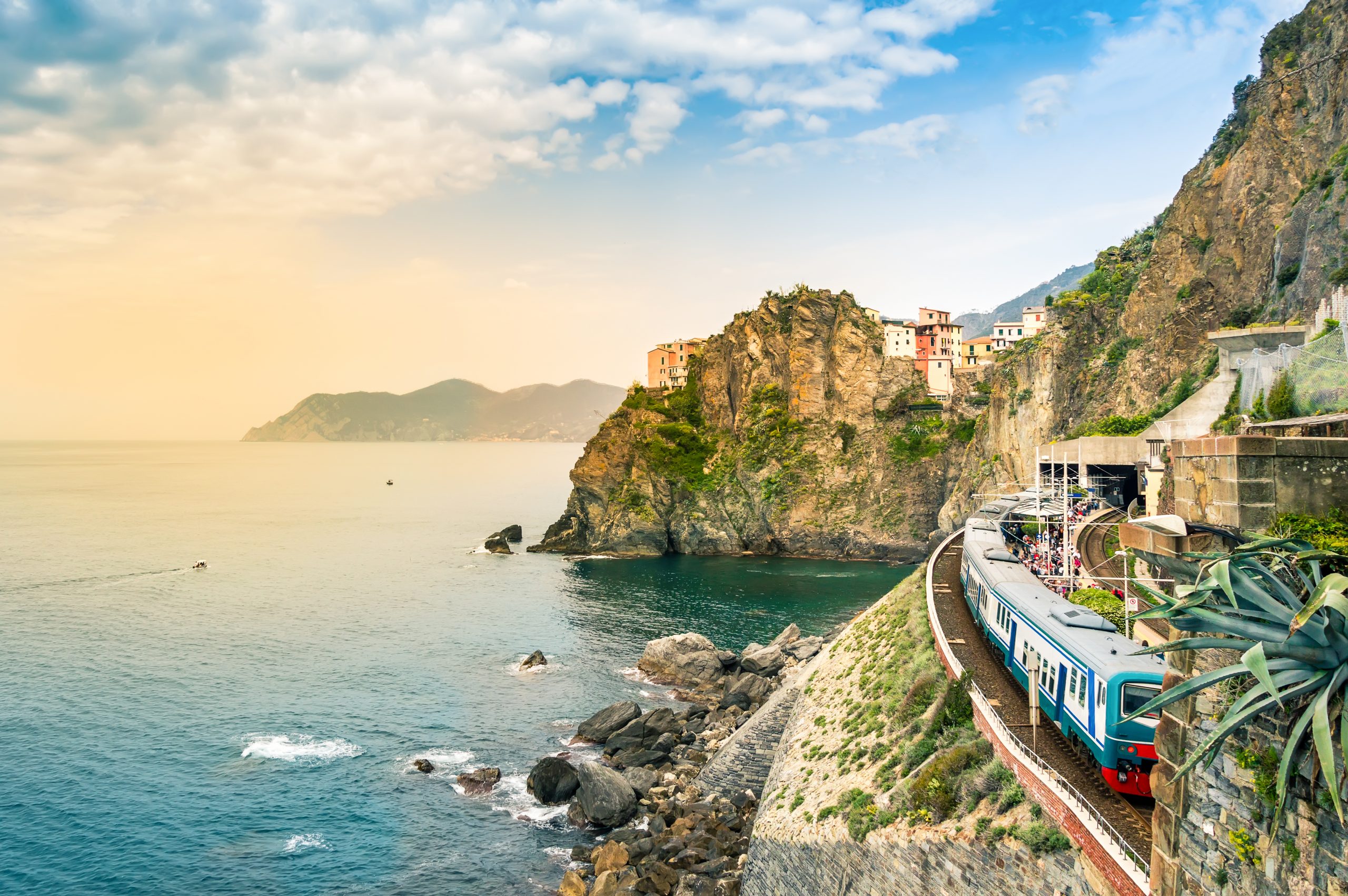 Manarola, Cinque Terre - train station in famous village with colorful houses on cliff over sea in Cinque Terre - Baller Alert Italy Will Reimburse Visitors Traveling By Train From Other Parts Of Italy