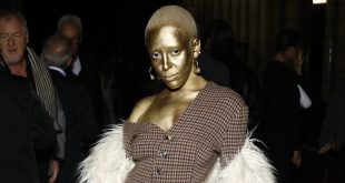 Doja Cat Responds to Critics Over "Ugly" Gold Makeup at Paris Fashion Show