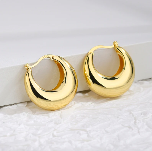 Chunky Gold Earrings Are In and Here to Stay