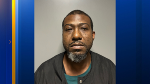 Barbershop Owner Charged with Murder After Neighbor's Racial Slurs