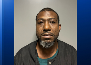 Barbershop Owner Charged with Murder After Neighbor's Racial Slurs