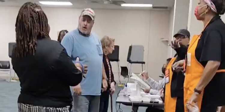 White Voter Lashes Out at Black Poll Workers Who Ask Him to Remove Anti-Joe Biden Hat [Video]