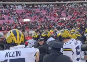 Police and Pepper Spray: Chaos Erupts After Michigan's Win Over Ohio State, Players Clash on Field [Video]