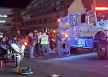 10 People Injured After Police Officer Allegedly Popping a Wheelie Plowed Into Parade-Goers