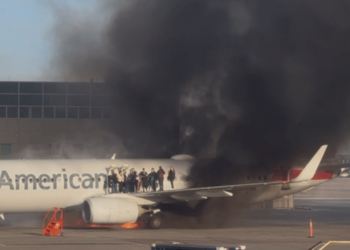 American Airlines Passengers Evacuated After Plane Catches Fire at Denver Airport [Video]