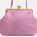 Ballerific Fashion: Coach’s Viral Kisslock Bag Sold Out in Minutes