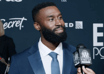 Tosin Morohunfola on the Ebony Power 100 red carpet during Baller Alert exclusive interview