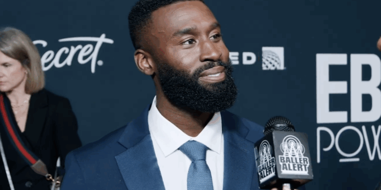 Tosin Morohunfola on the Ebony Power 100 red carpet during Baller Alert exclusive interview