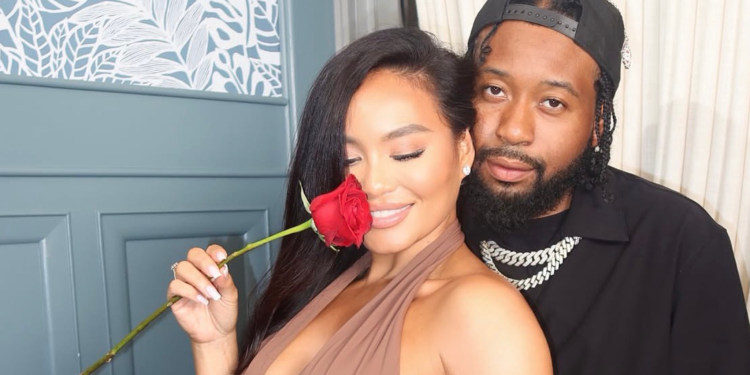 dj-akademiks-daphne-joy - Baller Alert Daphne Joy holding a red rose posing with DJ Akademiks after they linked up