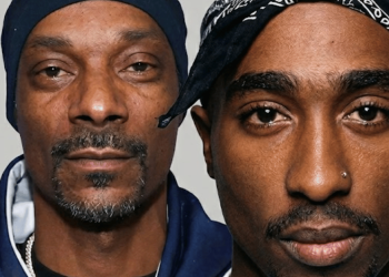 Close-up of two men facing the camera: older man with grey beard on the left, younger man with a nose ring on the right wearing a bandana.