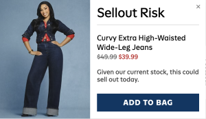 Model wearing dark indigo curvy extra high-waisted wide-leg jeans; sale price .99.