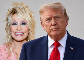 Smiling blonde woman in a pink sequined dress and large earrings stands next to a serious-looking man in a navy suit with a red tie and a US flag pin.