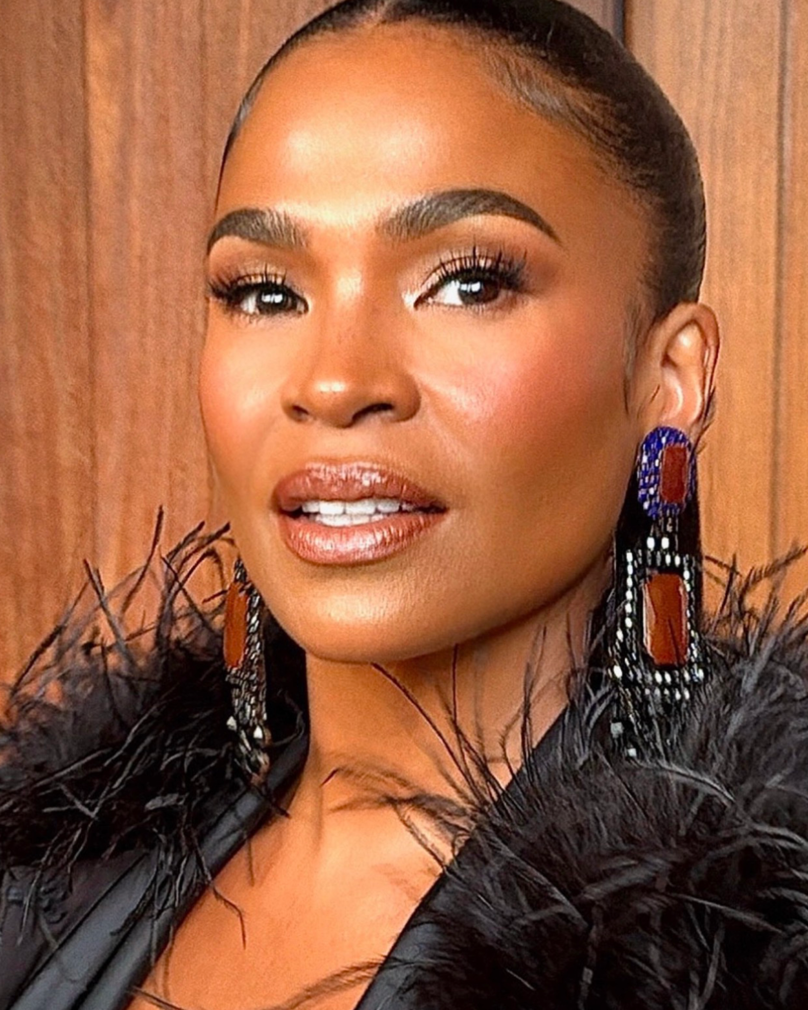 Nia Long - Baller Alert Nia Long at the 2026 Academy Museum Gala in a black satin gown and feathered shrug